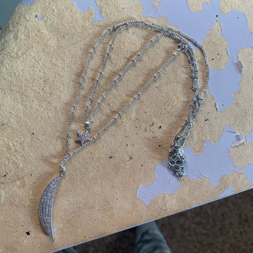 A moon and star double necklace connected for $5
